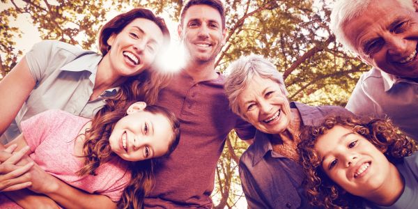 Happy multi-generational family outdoors